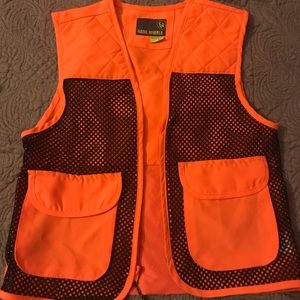 Youth hunting vest with a camouflage beanie